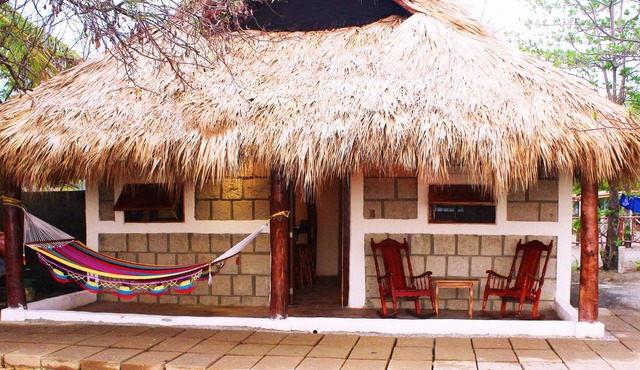 La Casita Nica. In Front Of The House Lies One Of The Best Waves In Nicaragua. in Managua