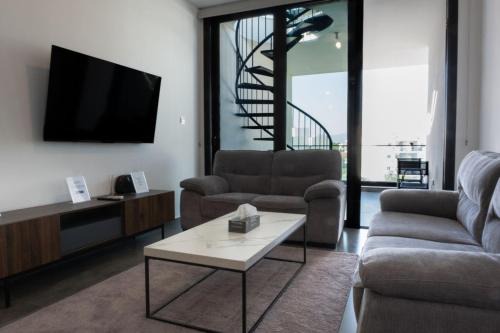 Luxurious two bedroom apartment with roof garden in Kato Lakatamia