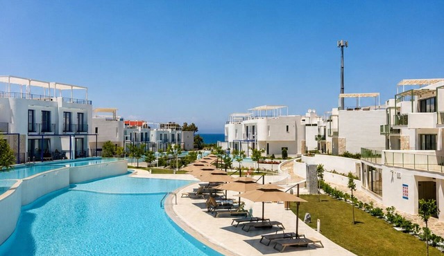 Modern rooftop apartment with ocean views and a pool in Lapta