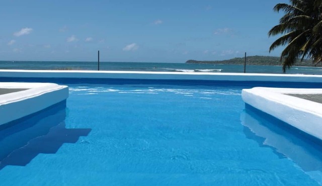 Simple Garden Room with Access to Oceanfront Pool in Corn Islands