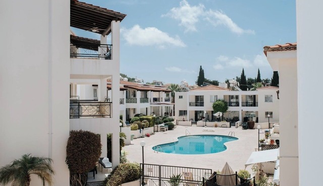 Sunny 2BR apartment with pool in quiet residential complex.