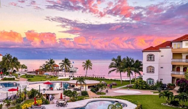 UNRIVALED VIEWS from DESIGNER RENOVATED PENTHOUSE, Top 3BR rental @ GRAND CARIBE in Ambergris Caye