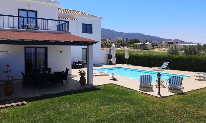 Pomos Villa | Beachfront 3 bed villa with sea views.