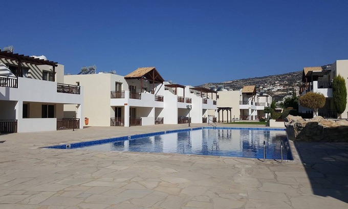 Peyia Town Apartment | Wonderful studio with double bed, kitchen & shower room, sunny balcony