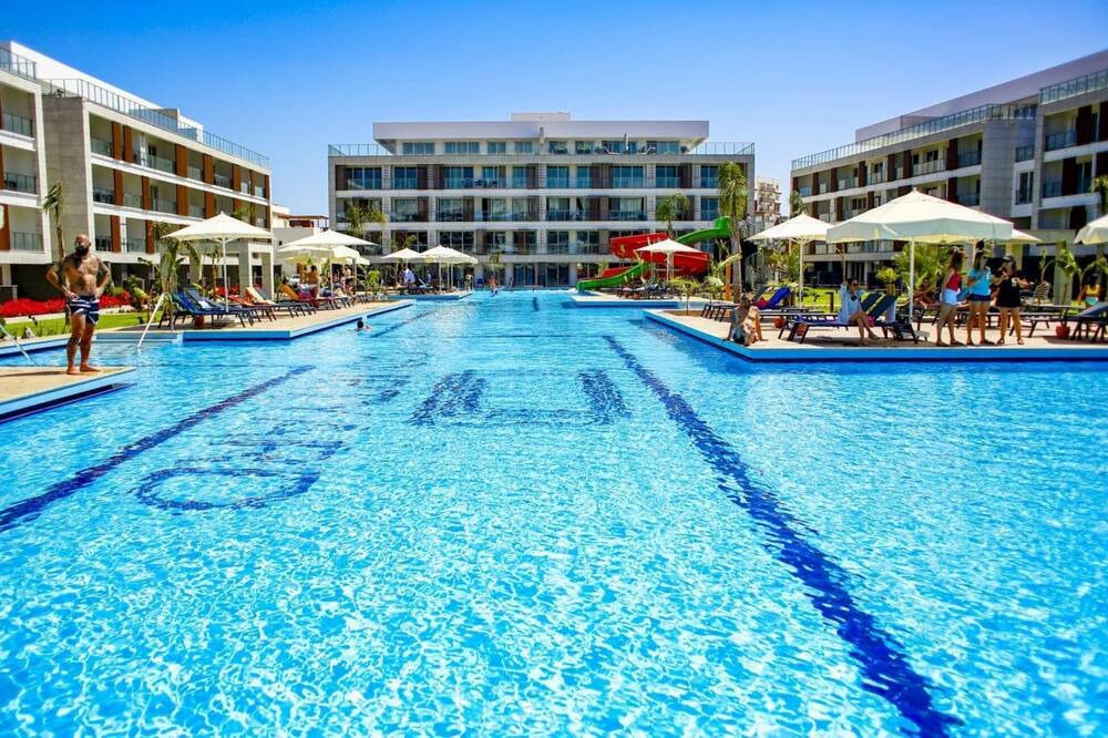 Trikomo Apartment | Delightful Studio Flat Close to the Beach with Shared Pool and Balcony in Iskele, Cyprus
