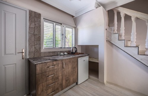 Karavas Villa | Riverside Coastal Retreat