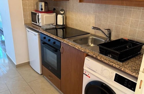 Peyia Town Apartment | New listing - Ground floor Studio apartment with Aircon, WIFI & 3 pools