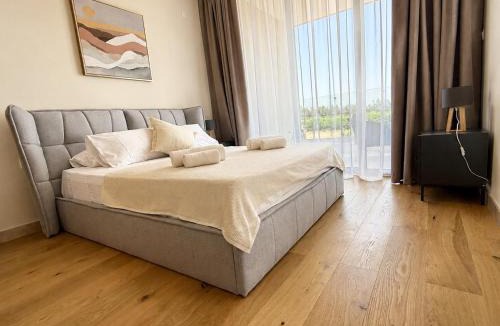 Emba Apartment | Avalon Gardens B203 - Designer Resort Apartment
