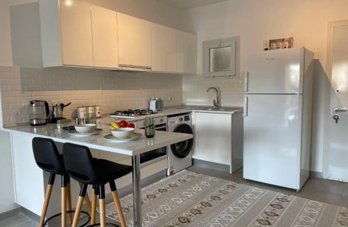 Trikomo Apartment | Family friendly modern flat in Caesar Resort &SPA, Long Beach İSKELE, KKTC