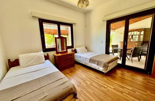 Choirokoitia Villa | Mountain view 6 bed mansion with Private Padel Court, Pool & Gym