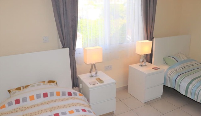Direct access to the pool from the garden. A sandy beach is a few minutes away.