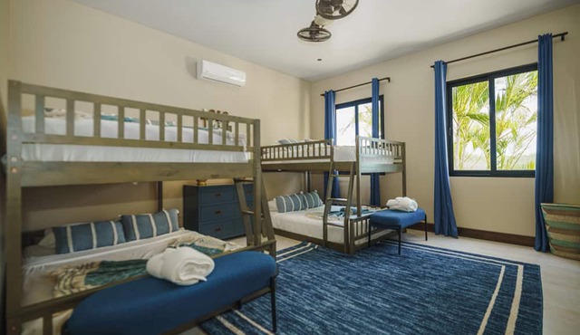 Ocean View Four Bedroom Villa 3 King + bunk – Prana Maya Island Resort in Placencia