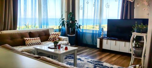 Esentepe Turtle Bay Village 2-bedroom sea view apartment in Eylenja